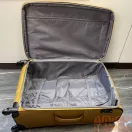 Touareg mustársárga textil négykerekű közepes bőrönd air6932